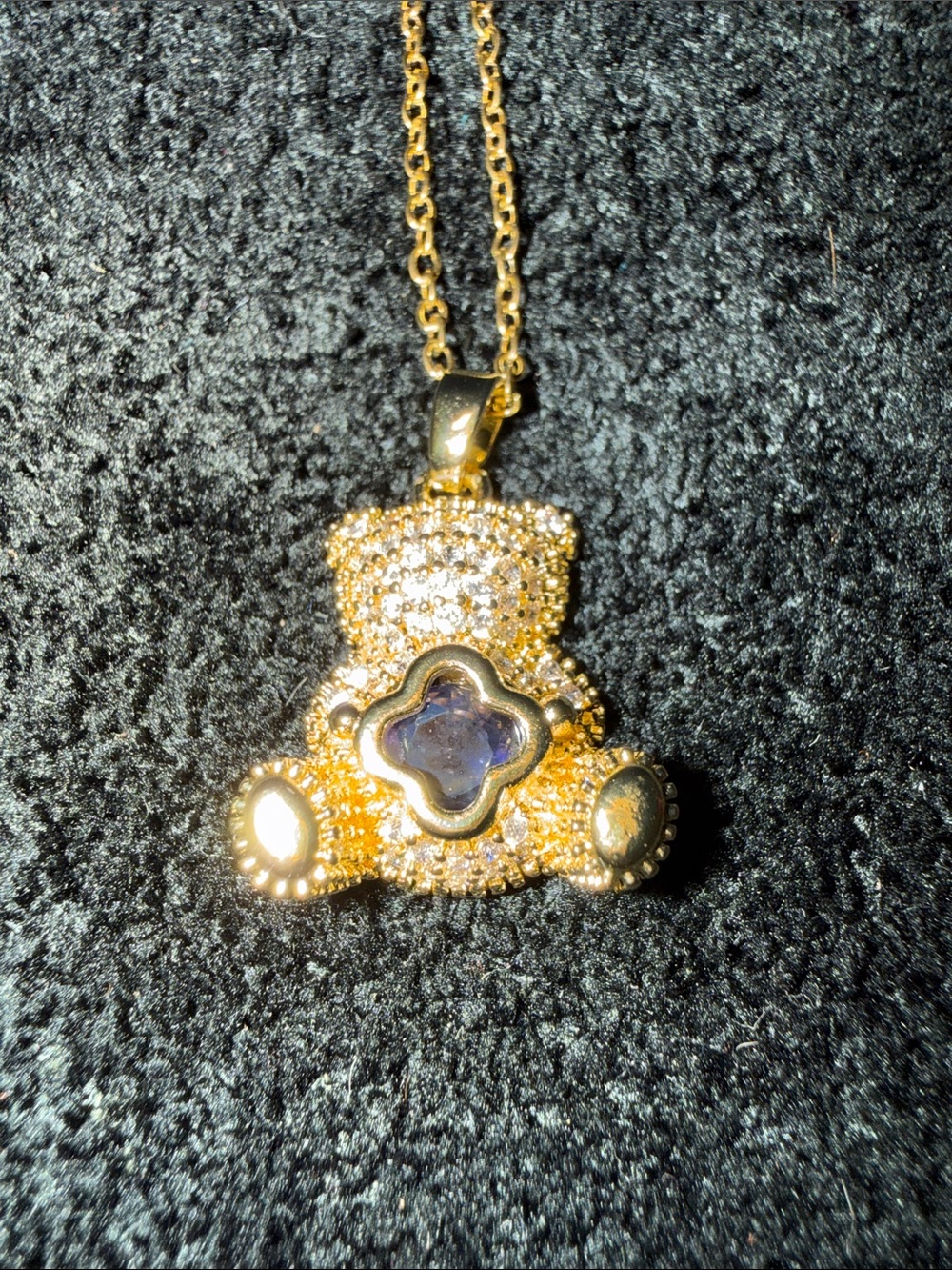Gold Teddy Bear Pendant Necklace with Purple Center Stone